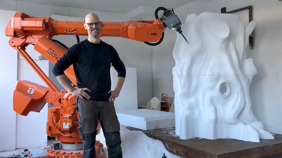 Joakim and his trusted robotic arm